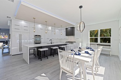 This exceptional waterfront residence, built in 2023, delivers a on The Renaisssance Vinoy Golf Club in Florida - for sale on GolfHomes.com, golf home, golf lot