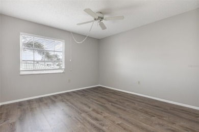 One or more photo(s) has been virtually staged. Charming upper on Capri Isle Golf Club in Florida - for sale on GolfHomes.com, golf home, golf lot