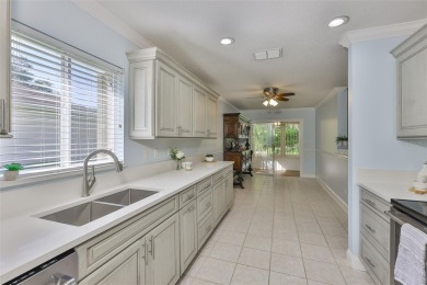 Care-free Florida living awaits in this impeccably maintained on Falcon Watch Golf Club in Florida - for sale on GolfHomes.com, golf home, golf lot