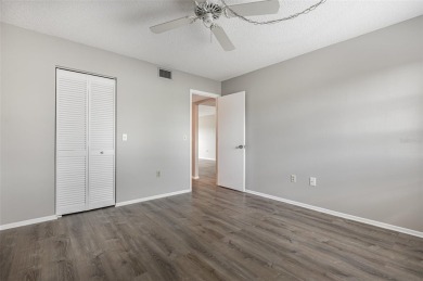 One or more photo(s) has been virtually staged. Charming upper on Capri Isle Golf Club in Florida - for sale on GolfHomes.com, golf home, golf lot