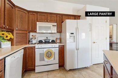 DARLING HOME WITH 3 BEDROOMS, 2 BATHROOMS, PLUS LARGE BONUS ROOM on Desert Lakes Golf Course in Arizona - for sale on GolfHomes.com, golf home, golf lot