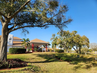 This tidy RV lot is perfect for the full time RVer or the on Deer Creek RV Golf Resort in Florida - for sale on GolfHomes.com, golf home, golf lot