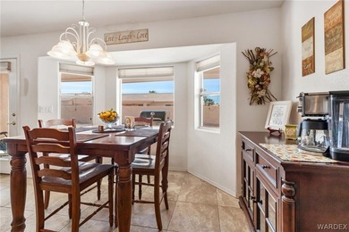 DARLING HOME WITH 3 BEDROOMS, 2 BATHROOMS, PLUS LARGE BONUS ROOM on Desert Lakes Golf Course in Arizona - for sale on GolfHomes.com, golf home, golf lot