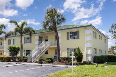 One or more photo(s) has been virtually staged. Charming upper on Capri Isle Golf Club in Florida - for sale on GolfHomes.com, golf home, golf lot