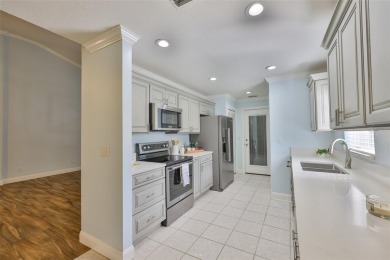 Care-free Florida living awaits in this impeccably maintained on Falcon Watch Golf Club in Florida - for sale on GolfHomes.com, golf home, golf lot