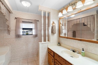 Welcome to resort-style living in Kove Estates, a sought-after on Cypress Point RV Golf Club in Florida - for sale on GolfHomes.com, golf home, golf lot