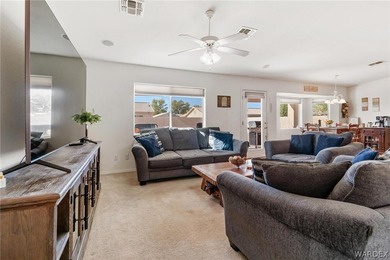 DARLING HOME WITH 3 BEDROOMS, 2 BATHROOMS, PLUS LARGE BONUS ROOM on Desert Lakes Golf Course in Arizona - for sale on GolfHomes.com, golf home, golf lot