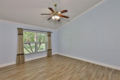 Care-free Florida living awaits in this impeccably maintained on Falcon Watch Golf Club in Florida - for sale on GolfHomes.com, golf home, golf lot