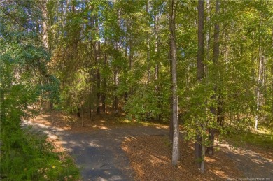 This is the perfect lot to build your dream home in the Highland on Carolina Trace Country Club in North Carolina - for sale on GolfHomes.com, golf home, golf lot