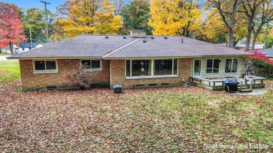 Location, location, location! This 4 bedroom, 2 1/2 bath all on Muskegon Country Club in Michigan - for sale on GolfHomes.com, golf home, golf lot