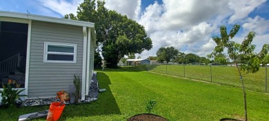 Come settle down and relax in a beautiful, manufactured home on Fairways Country Club in Florida - for sale on GolfHomes.com, golf home, golf lot