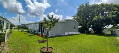 Come settle down and relax in a beautiful, manufactured home on Fairways Country Club in Florida - for sale on GolfHomes.com, golf home, golf lot