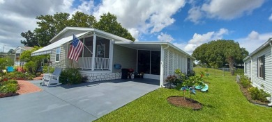 Come settle down and relax in a beautiful, manufactured home on Fairways Country Club in Florida - for sale on GolfHomes.com, golf home, golf lot