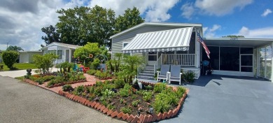 Come settle down and relax in a beautiful, manufactured home on Fairways Country Club in Florida - for sale on GolfHomes.com, golf home, golf lot