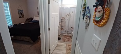 Come settle down and relax in a beautiful, manufactured home on Fairways Country Club in Florida - for sale on GolfHomes.com, golf home, golf lot