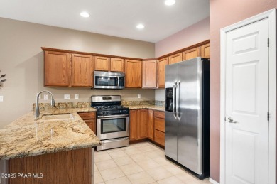 This charming 2 bedroom townhome has beautiful views of the on Prescott Golf and Country Club in Arizona - for sale on GolfHomes.com, golf home, golf lot