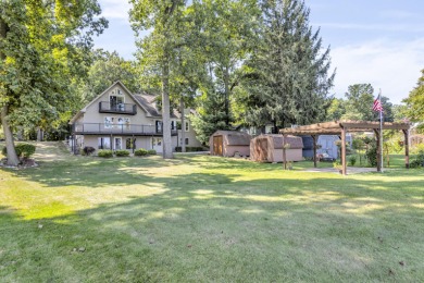 LUXURIOUS LAKEFRONT HOME ON MICHIGAN'S CRYSTAL CLEAR  CARRIBEAN on Deer Run Golf Club in Michigan - for sale on GolfHomes.com, golf home, golf lot