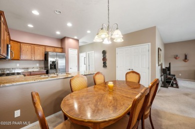 This charming 2 bedroom townhome has beautiful views of the on Prescott Golf and Country Club in Arizona - for sale on GolfHomes.com, golf home, golf lot