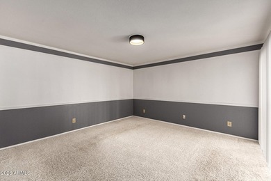 Expansive backyard with extended covered patio highlights this on Cottonwood Country Club in Arizona - for sale on GolfHomes.com, golf home, golf lot