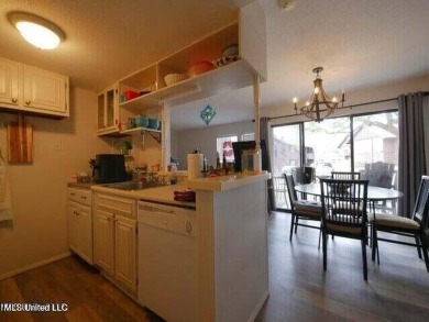 THIS UNFURNISHED 1 BEDROOM CONDO IS ON THE FIRST FLOOR AND on Diamondhead Country Club in Mississippi - for sale on GolfHomes.com, golf home, golf lot