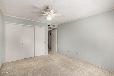 Expansive backyard with extended covered patio highlights this on Cottonwood Country Club in Arizona - for sale on GolfHomes.com, golf home, golf lot