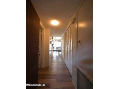 THIS UNFURNISHED 1 BEDROOM CONDO IS ON THE FIRST FLOOR AND on Diamondhead Country Club in Mississippi - for sale on GolfHomes.com, golf home, golf lot