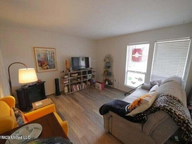 THIS UNFURNISHED 1 BEDROOM CONDO IS ON THE FIRST FLOOR AND on Diamondhead Country Club in Mississippi - for sale on GolfHomes.com, golf home, golf lot