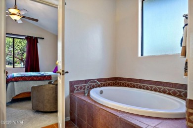 Welcome to your dream retreat! This impressive 3-bedroom, 2-bath on Juniper Ridge R.V. Golf Resort in Arizona - for sale on GolfHomes.com, golf home, golf lot