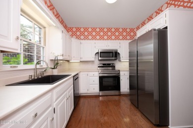 Located in one of the area's most coveted townhome neighborhoods on Knollwood Fairways and Driving  in North Carolina - for sale on GolfHomes.com, golf home, golf lot