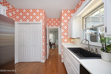 Located in one of the area's most coveted townhome neighborhoods on Knollwood Fairways and Driving  in North Carolina - for sale on GolfHomes.com, golf home, golf lot