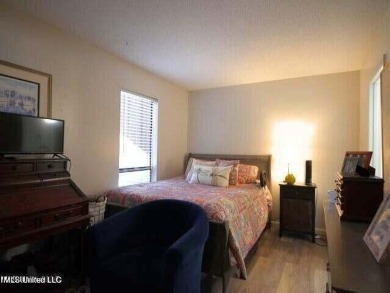 THIS UNFURNISHED 1 BEDROOM CONDO IS ON THE FIRST FLOOR AND on Diamondhead Country Club in Mississippi - for sale on GolfHomes.com, golf home, golf lot