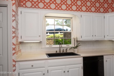 Located in one of the area's most coveted townhome neighborhoods on Knollwood Fairways and Driving  in North Carolina - for sale on GolfHomes.com, golf home, golf lot