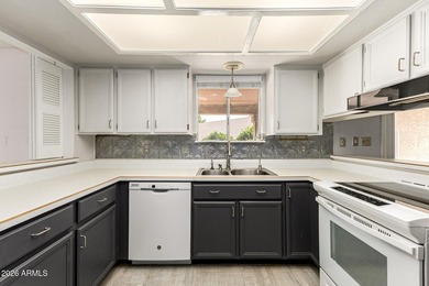 Expansive backyard with extended covered patio highlights this on Cottonwood Country Club in Arizona - for sale on GolfHomes.com, golf home, golf lot