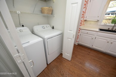Located in one of the area's most coveted townhome neighborhoods on Knollwood Fairways and Driving  in North Carolina - for sale on GolfHomes.com, golf home, golf lot