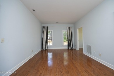 Located in one of the area's most coveted townhome neighborhoods on Knollwood Fairways and Driving  in North Carolina - for sale on GolfHomes.com, golf home, golf lot