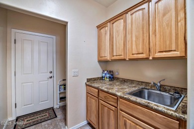 Welcome to your dream retreat! This impressive 3-bedroom, 2-bath on Juniper Ridge R.V. Golf Resort in Arizona - for sale on GolfHomes.com, golf home, golf lot