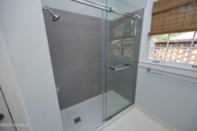 Located in one of the area's most coveted townhome neighborhoods on Knollwood Fairways and Driving  in North Carolina - for sale on GolfHomes.com, golf home, golf lot