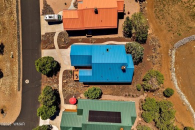 Welcome to your dream retreat! This impressive 3-bedroom, 2-bath on Juniper Ridge R.V. Golf Resort in Arizona - for sale on GolfHomes.com, golf home, golf lot
