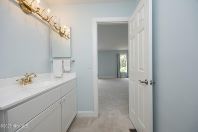 Located in one of the area's most coveted townhome neighborhoods on Knollwood Fairways and Driving  in North Carolina - for sale on GolfHomes.com, golf home, golf lot