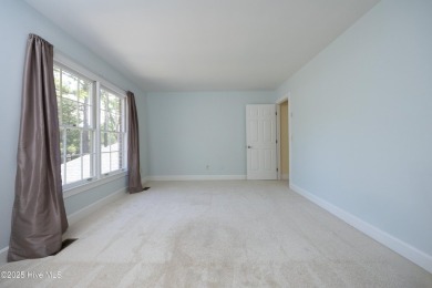 Located in one of the area's most coveted townhome neighborhoods on Knollwood Fairways and Driving  in North Carolina - for sale on GolfHomes.com, golf home, golf lot
