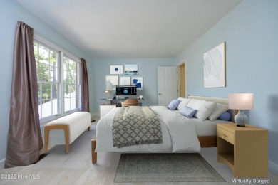 Located in one of the area's most coveted townhome neighborhoods on Knollwood Fairways and Driving  in North Carolina - for sale on GolfHomes.com, golf home, golf lot
