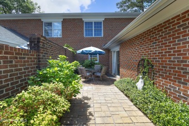 Located in one of the area's most coveted townhome neighborhoods on Knollwood Fairways and Driving  in North Carolina - for sale on GolfHomes.com, golf home, golf lot