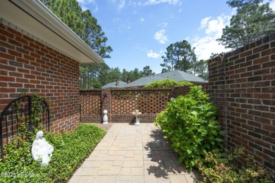 Located in one of the area's most coveted townhome neighborhoods on Knollwood Fairways and Driving  in North Carolina - for sale on GolfHomes.com, golf home, golf lot