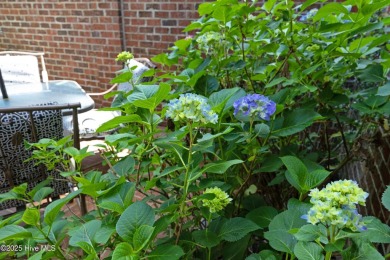 Located in one of the area's most coveted townhome neighborhoods on Knollwood Fairways and Driving  in North Carolina - for sale on GolfHomes.com, golf home, golf lot