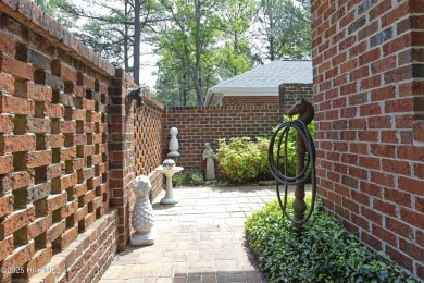 Located in one of the area's most coveted townhome neighborhoods on Knollwood Fairways and Driving  in North Carolina - for sale on GolfHomes.com, golf home, golf lot