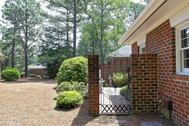 Located in one of the area's most coveted townhome neighborhoods on Knollwood Fairways and Driving  in North Carolina - for sale on GolfHomes.com, golf home, golf lot