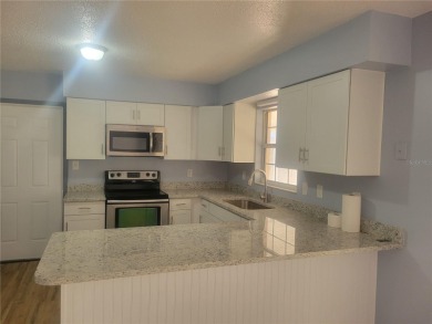 Gorgeous  3 bedroom with new kitchen ,granite countertop on Country Club At Silver Springs Shores in Florida - for sale on GolfHomes.com, golf home, golf lot