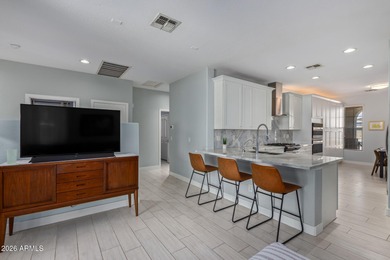 Nestled within the gated community of Seville, this beautifully on Seville Golf and Country Club in Arizona - for sale on GolfHomes.com, golf home, golf lot