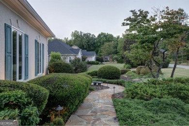 Welcome to this exceptional residence, perfectly situated on a on Canongate On White Oak Golf Course in Georgia - for sale on GolfHomes.com, golf home, golf lot