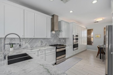 Nestled within the gated community of Seville, this beautifully on Seville Golf and Country Club in Arizona - for sale on GolfHomes.com, golf home, golf lot